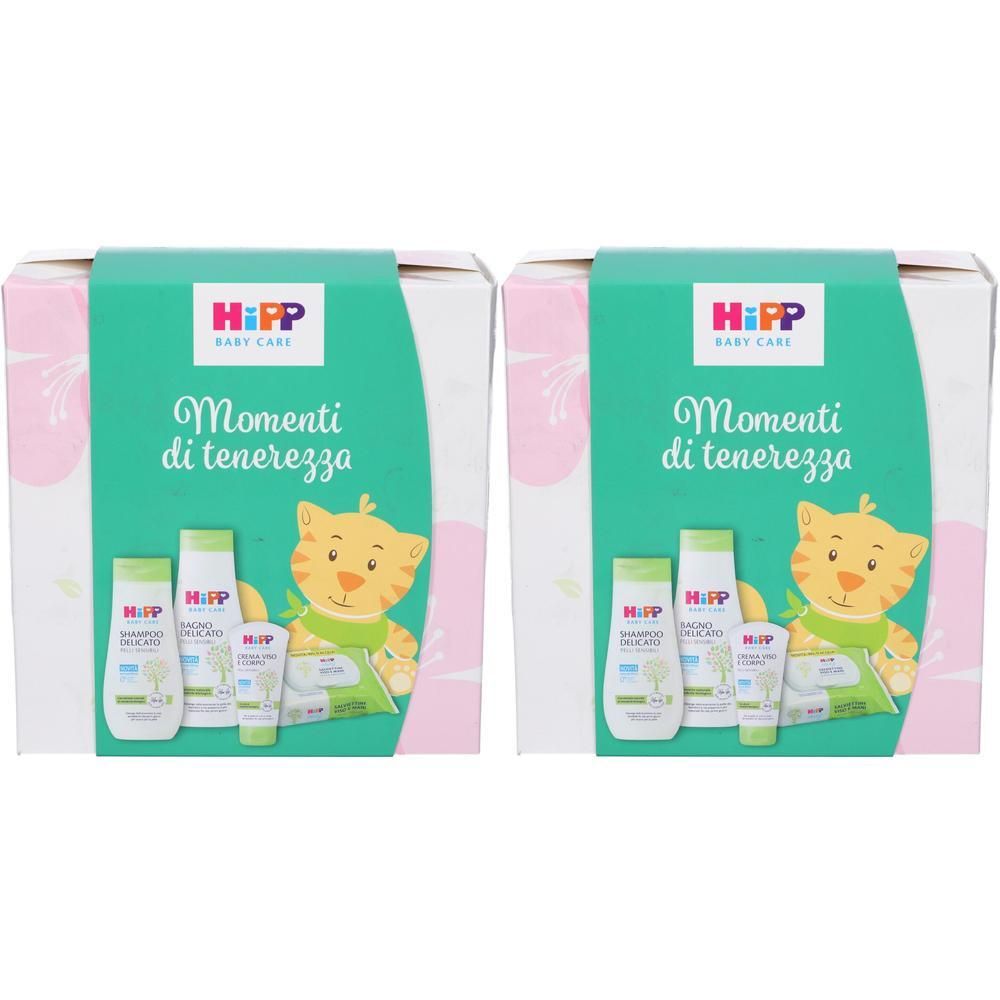 Confezione regalo Hipp Baby Care con quattro prodotti per la cura e una tigre dei cartoni animati.