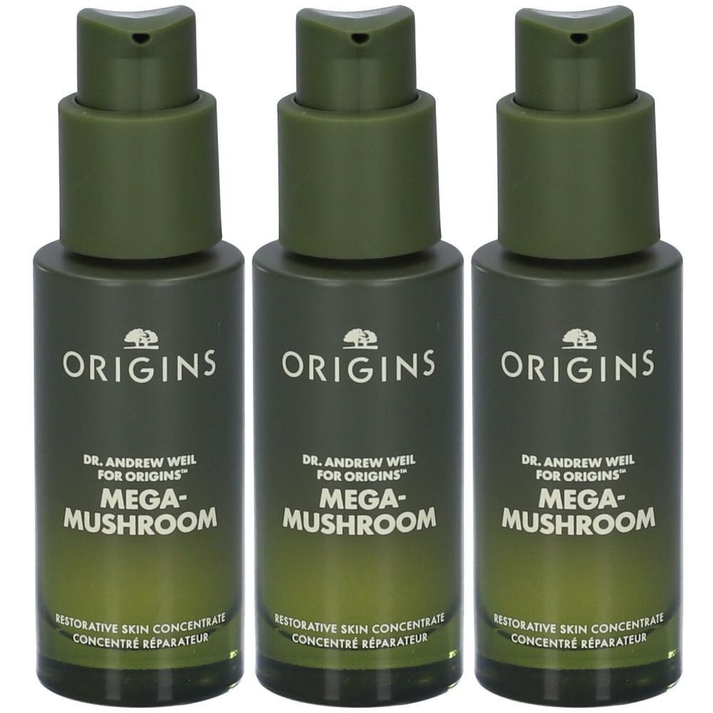 Tre flaconi Origins Mega-Mushroom Restorative Skin Concentrate con erogatori a pompa.