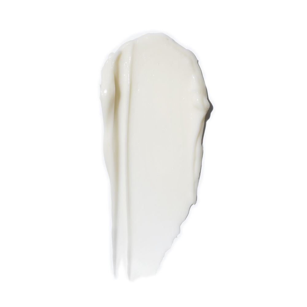 Un campione di crema bianca dalla texture liscia.