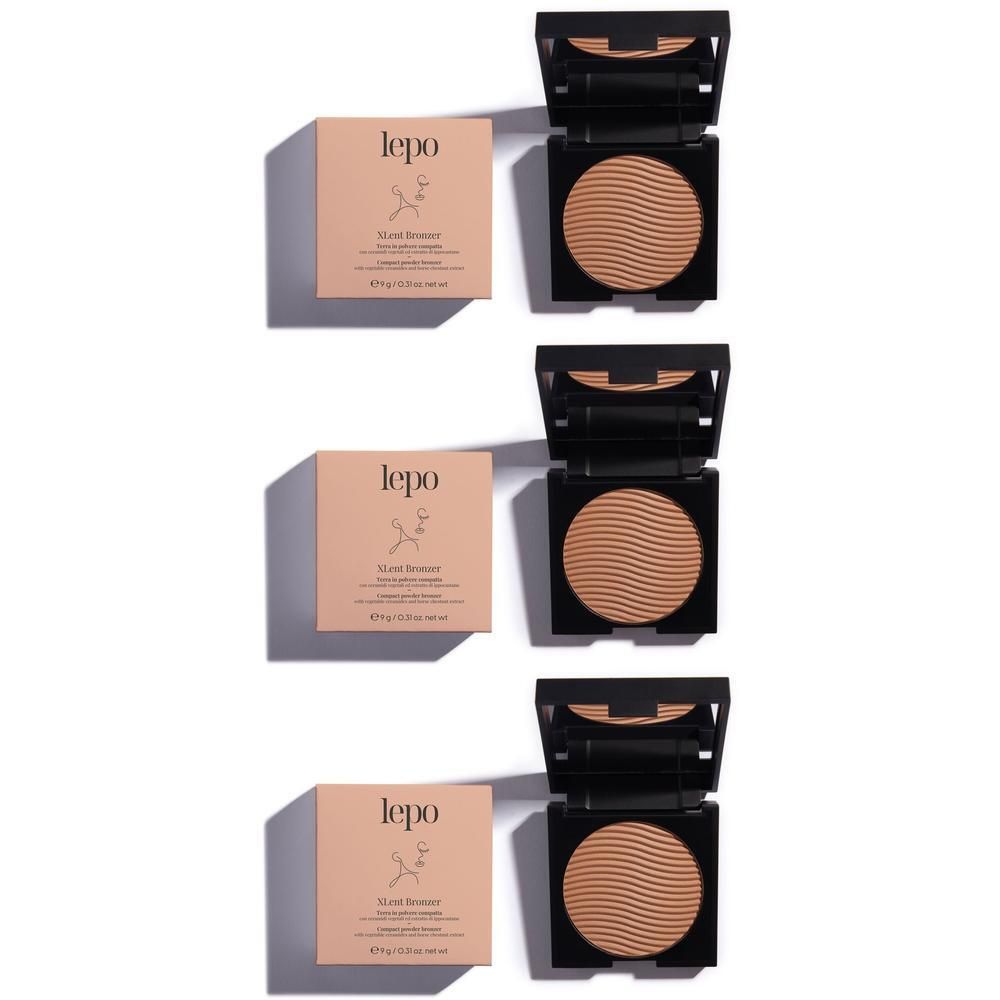Bronzer compatto in astuccio nero con specchio, polvere marrone con motivo a onde.