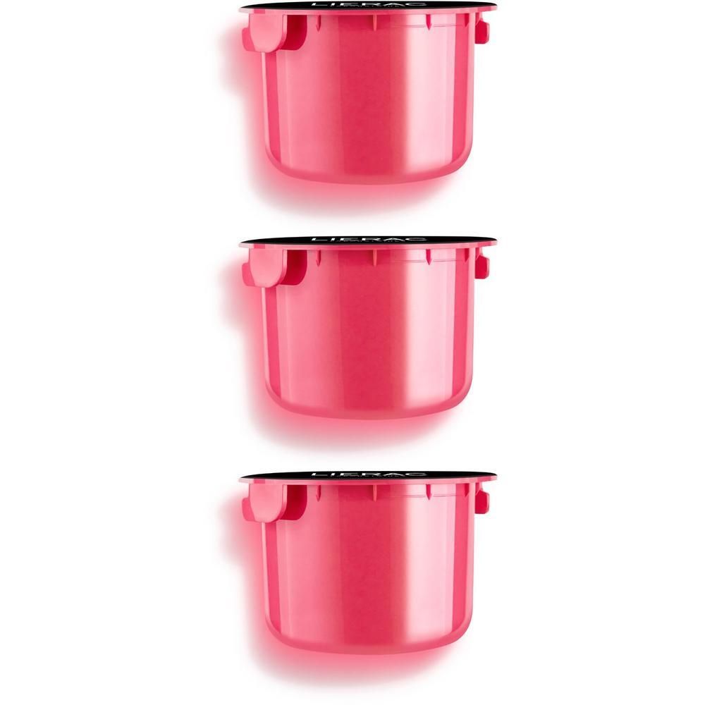 Tre ricariche rosa con tappo nero, allineate su sfondo bianco.