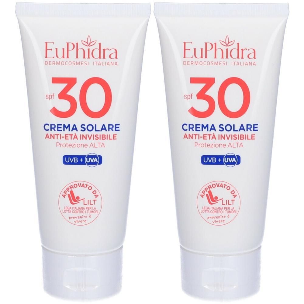 Due tubi bianchi di crema solare SPF 30. Protezione UVA e UVB.