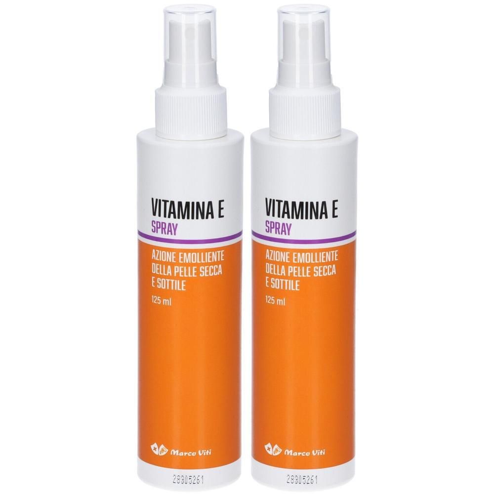 Due flaconi spray Vitamina E con erogatore. Base arancione, parte superiore bianca con fascia viola.
