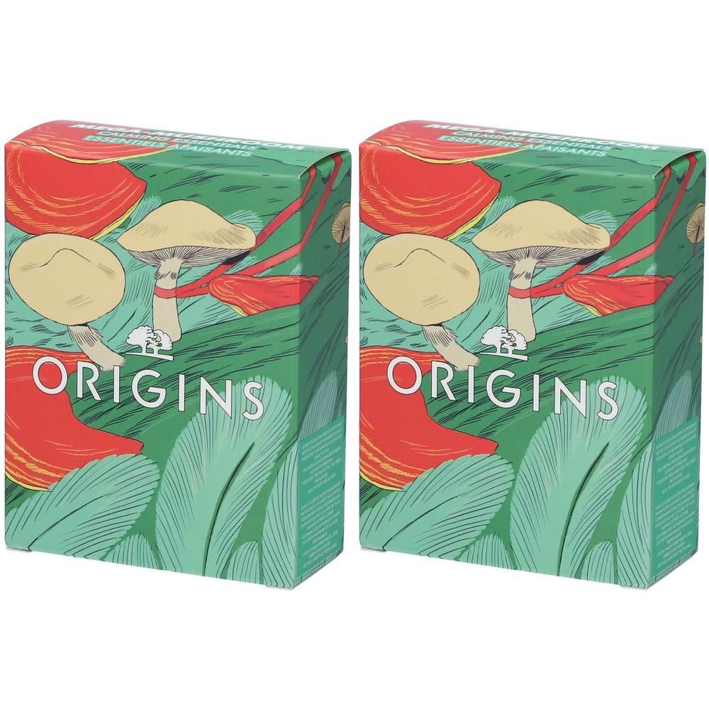 Due cofanetti regalo Origins con motivo a fungo e foglie.