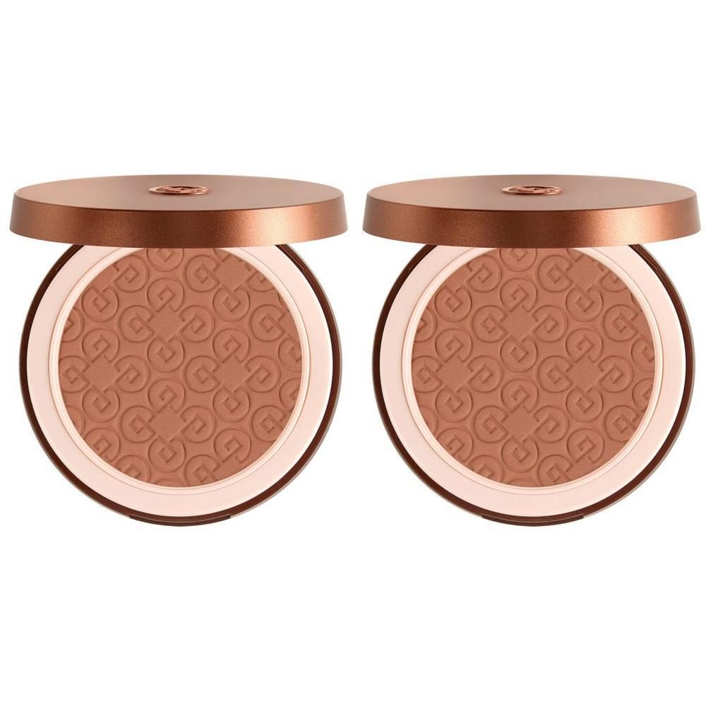 Due ciprie compatte abbronzanti con motivo in rilievo in astucci color bronzo.