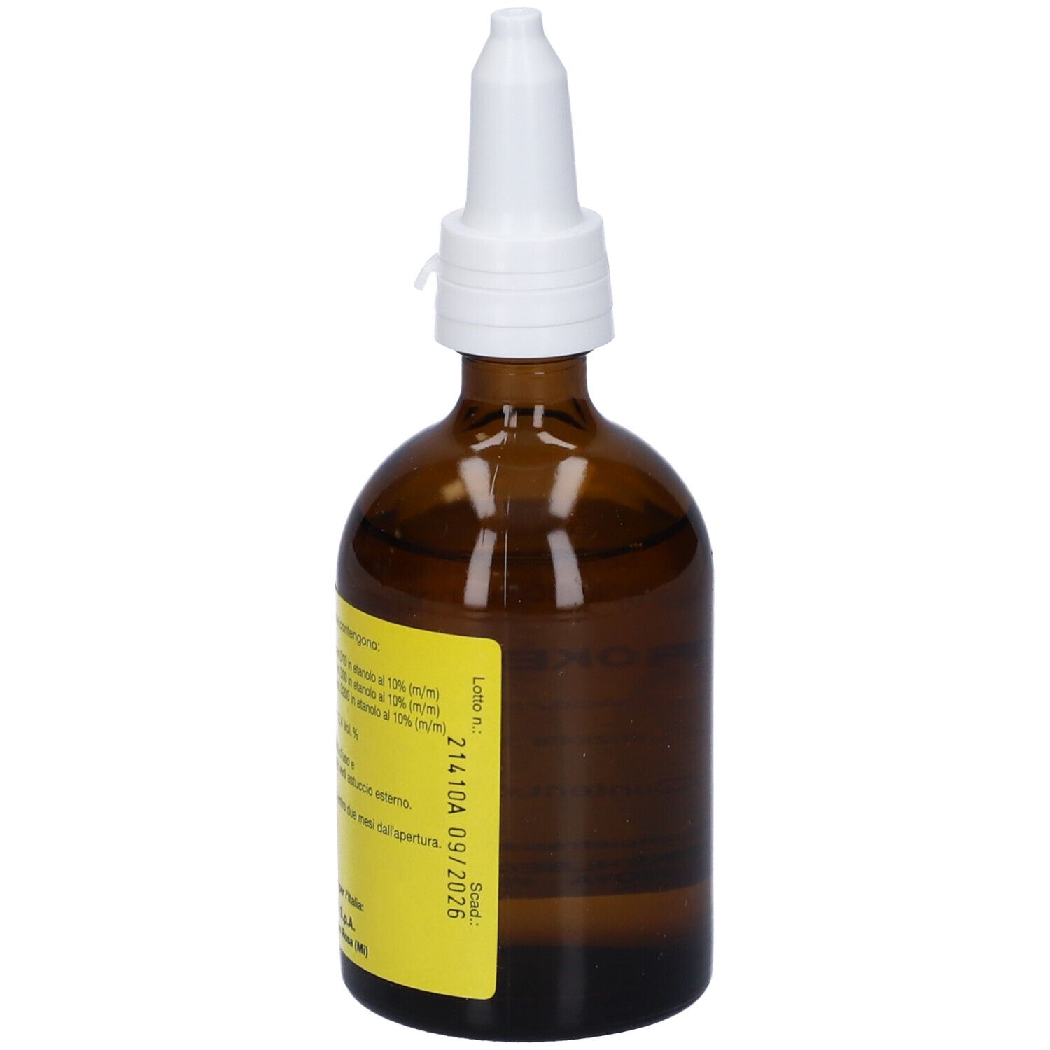 Flacone di vetro marrone con contagocce bianco. Etichetta gialla con testo e data di scadenza. Prodotto medico.