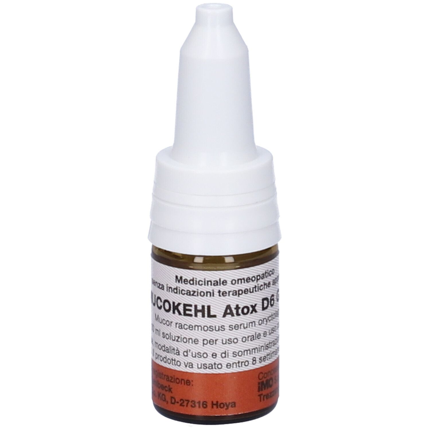 Flacone di vetro marrone con tappo bianco. Scritta: UCOKEHL Atox D6 Gocce. Prodotto medico.