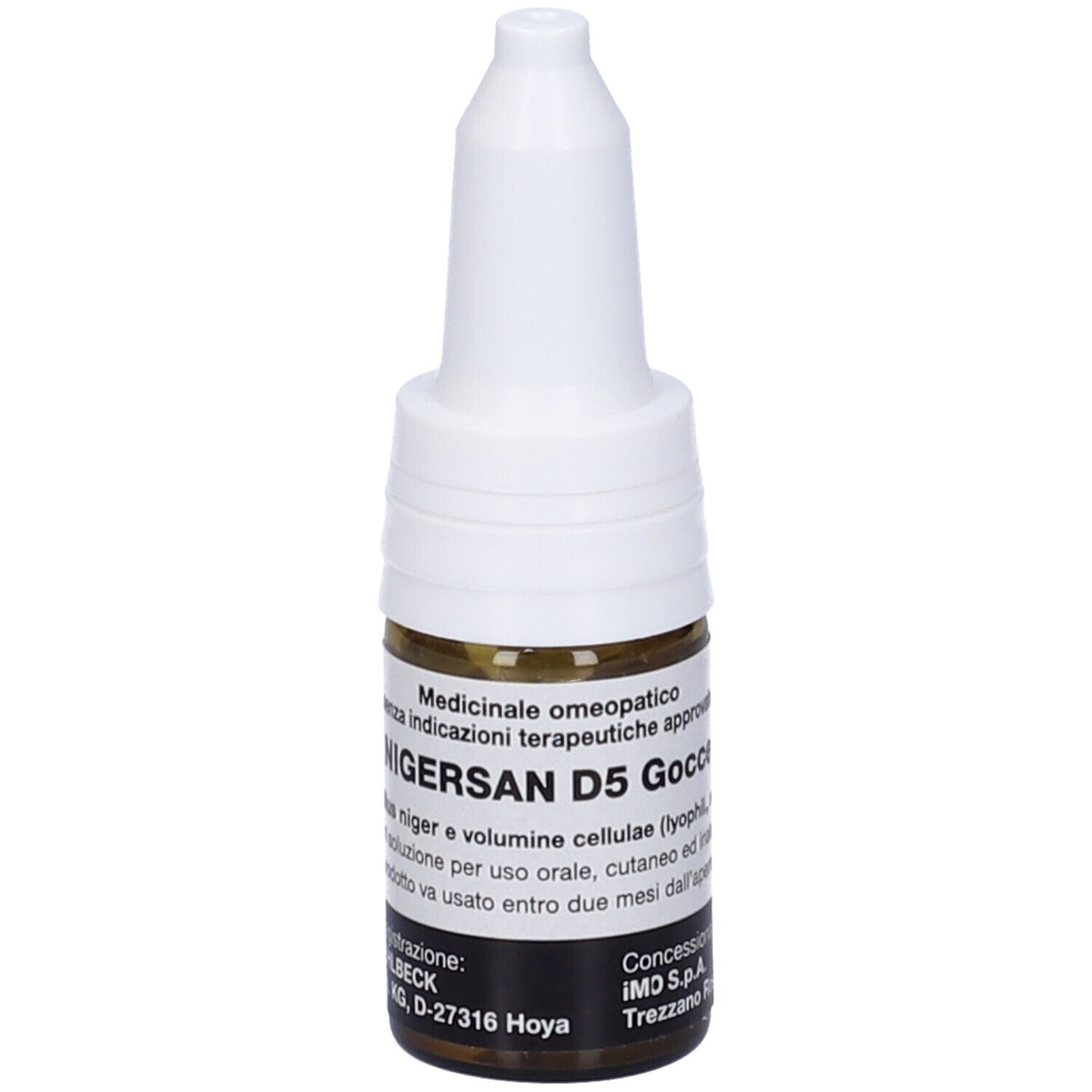 Flacone di vetro marrone con tappo bianco. Scritta: Nigersan D5 Gocce. Prodotto medico.
