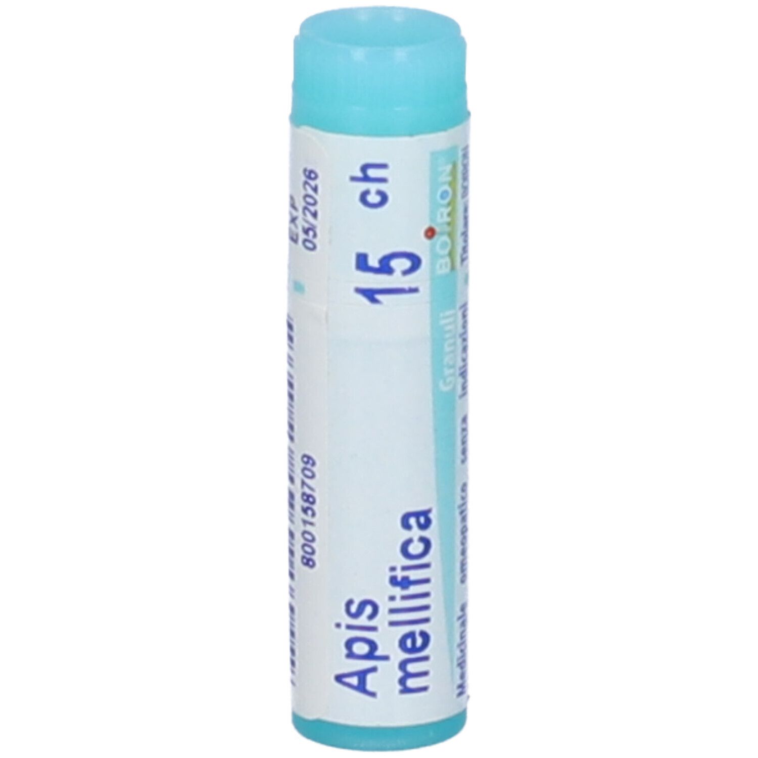 Tubo cilindrico con "Apis mellifica 15 ch". Design turchese e bianco. Stampa con scadenza e numero di lotto.