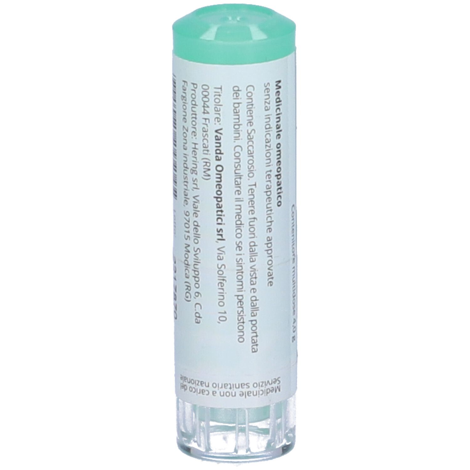 Confezione cilindrica con tappo verde. Scritta: Medicinale omeopatico. Indirizzo del produttore. Contiene saccarosio.