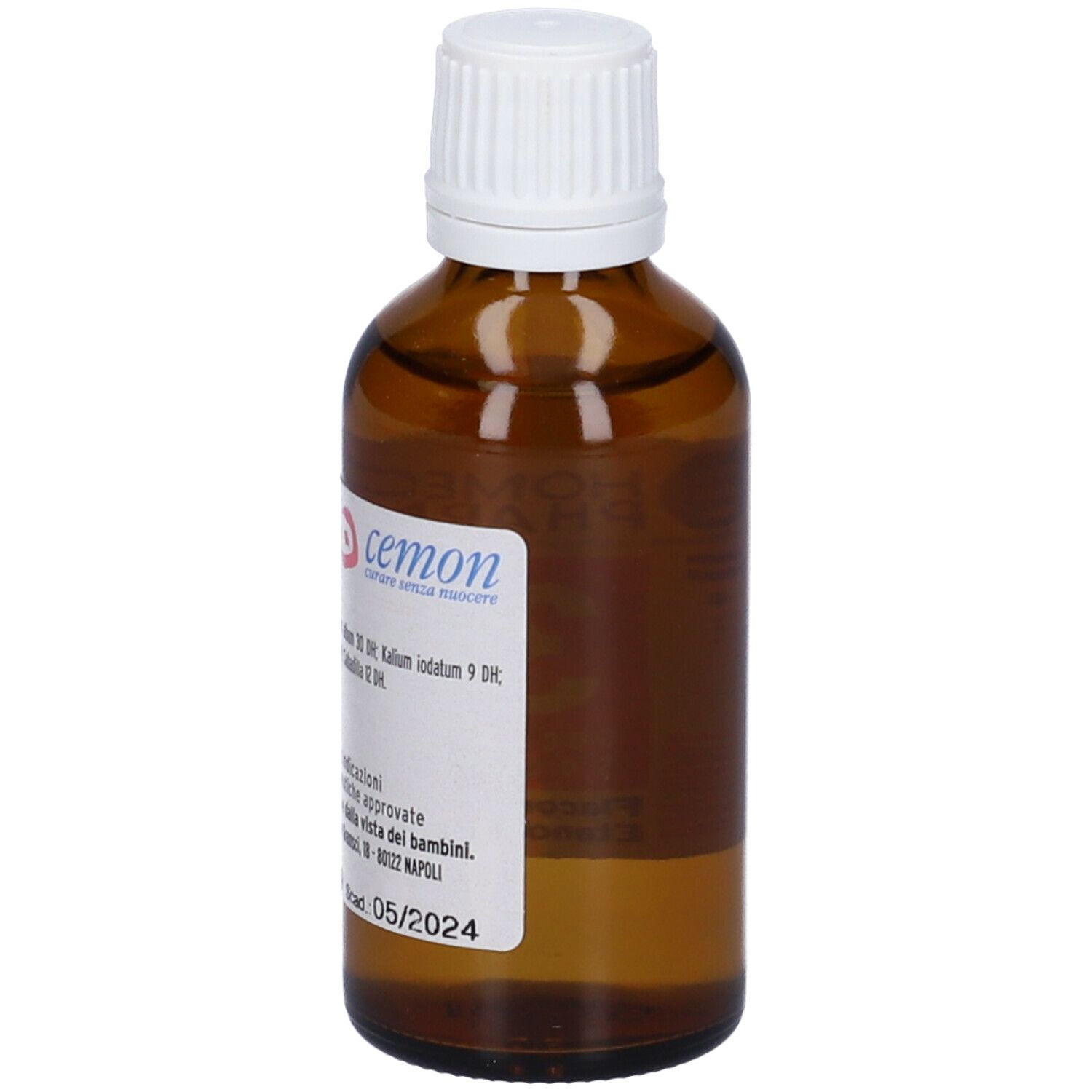 Flacone di vetro marrone con tappo bianco. Etichetta con informazioni sul prodotto. Liquido visibile.