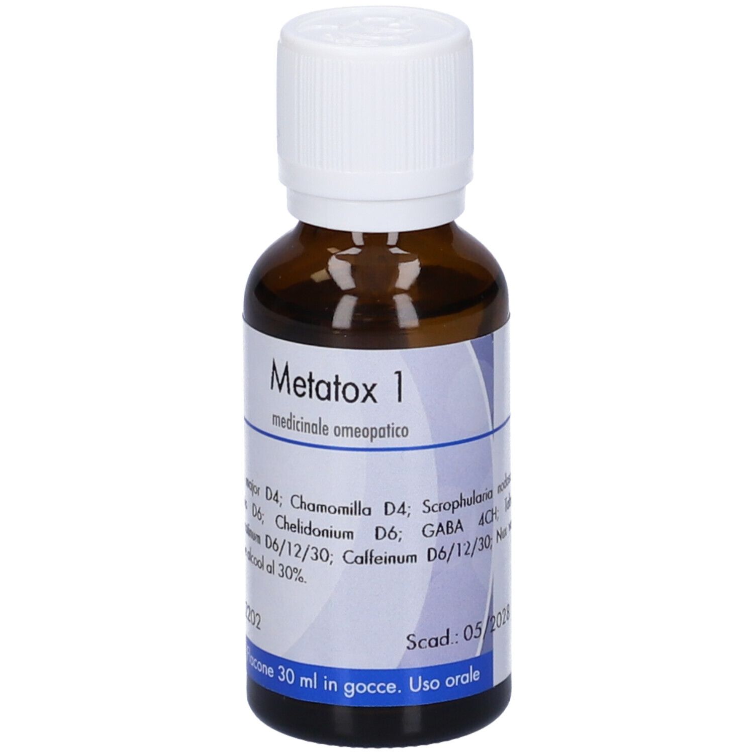 Flacone di vetro marrone con tappo bianco. Etichetta con informazioni sul prodotto. Testo: Metatox 1, 30 ml, scad. 05/2028.