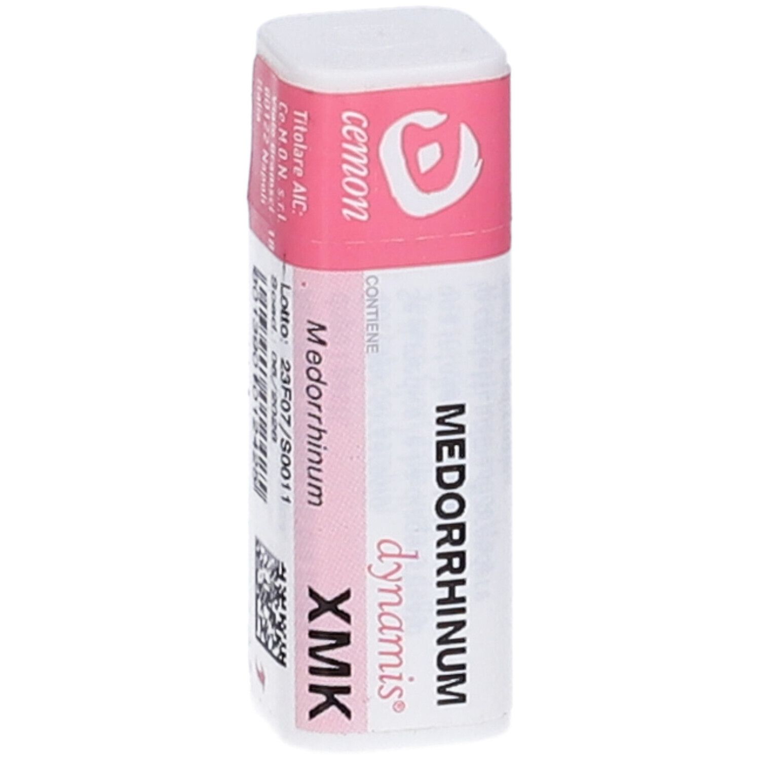 Confezione cilindrica con etichetta rosa. Scritte: cemon, Medorrhinum, dynamis, XMK, e altre informazioni testuali, codice QR.