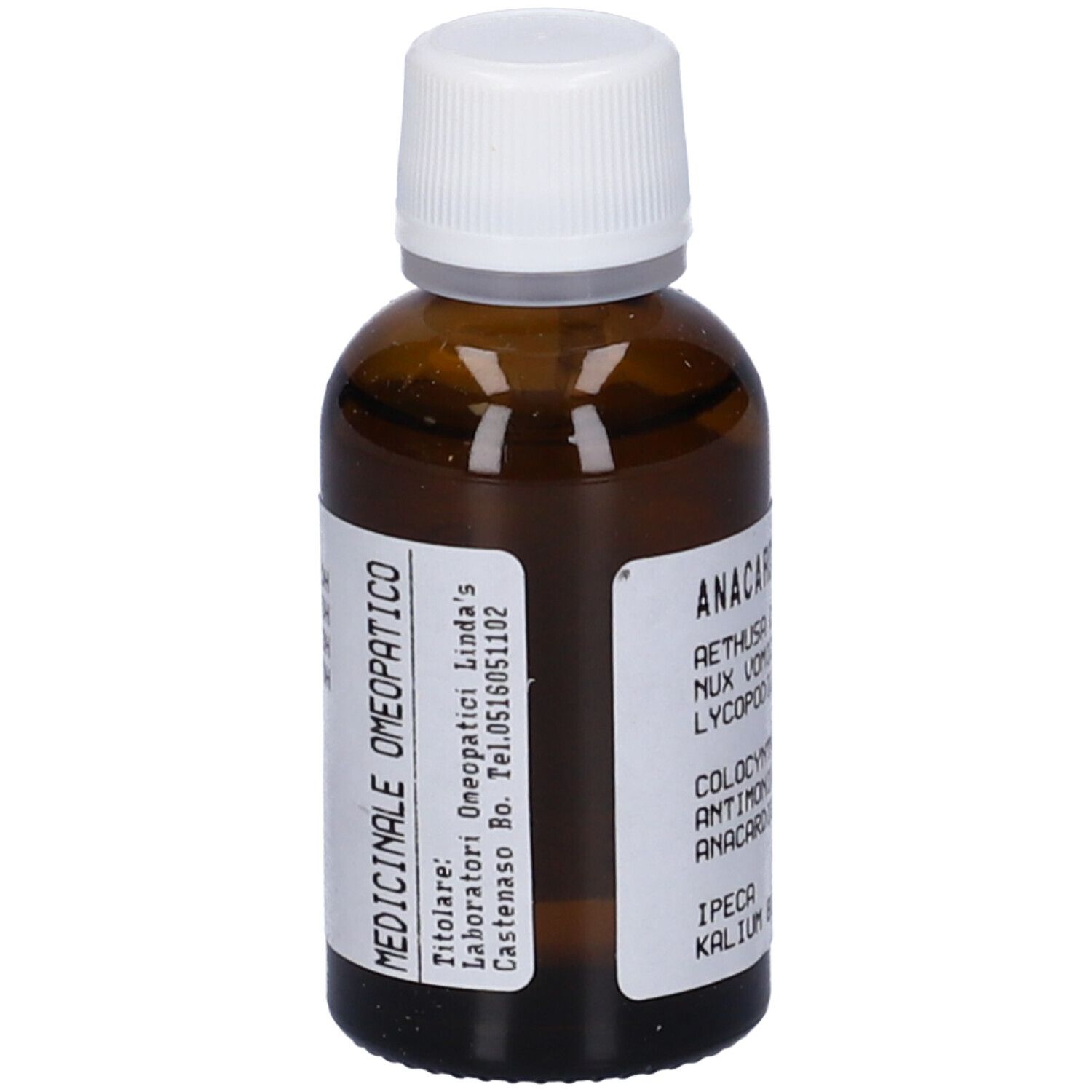 Flacone di vetro marrone con tappo bianco. Etichetta con nome del prodotto e ingredienti. Liquido.