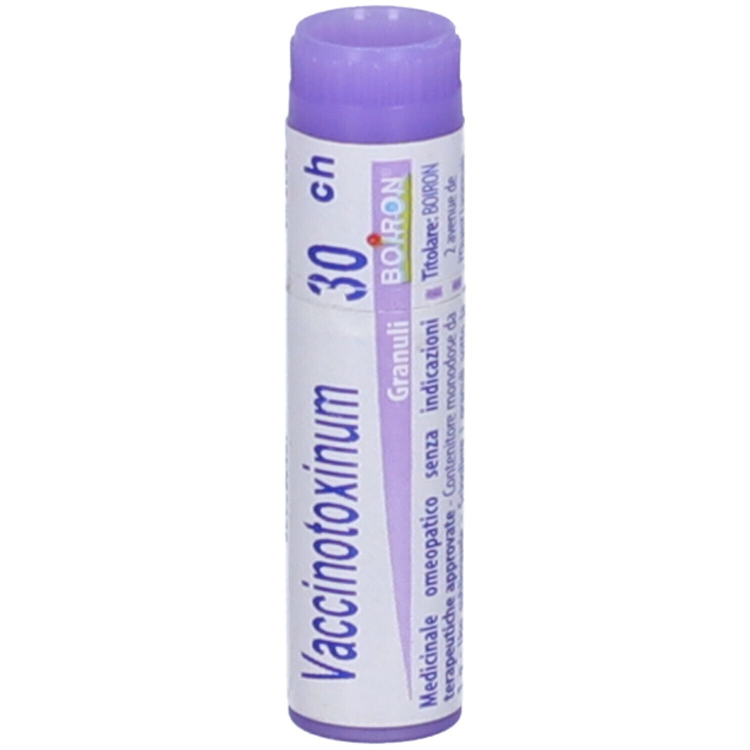 Confezione cilindrica, etichetta bianca con testo. Tappo viola. Scritta: Vaccinotoxinum 30 ch, Granuli, BOIRON. Indirizzo.