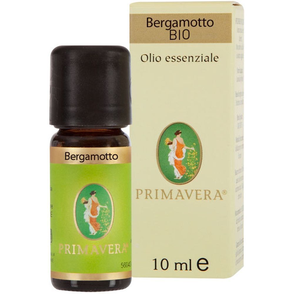 Flacone di vetro marrone con tappo nero ed etichetta verde. Accanto, una scatola color crema con informazioni sul prodotto.