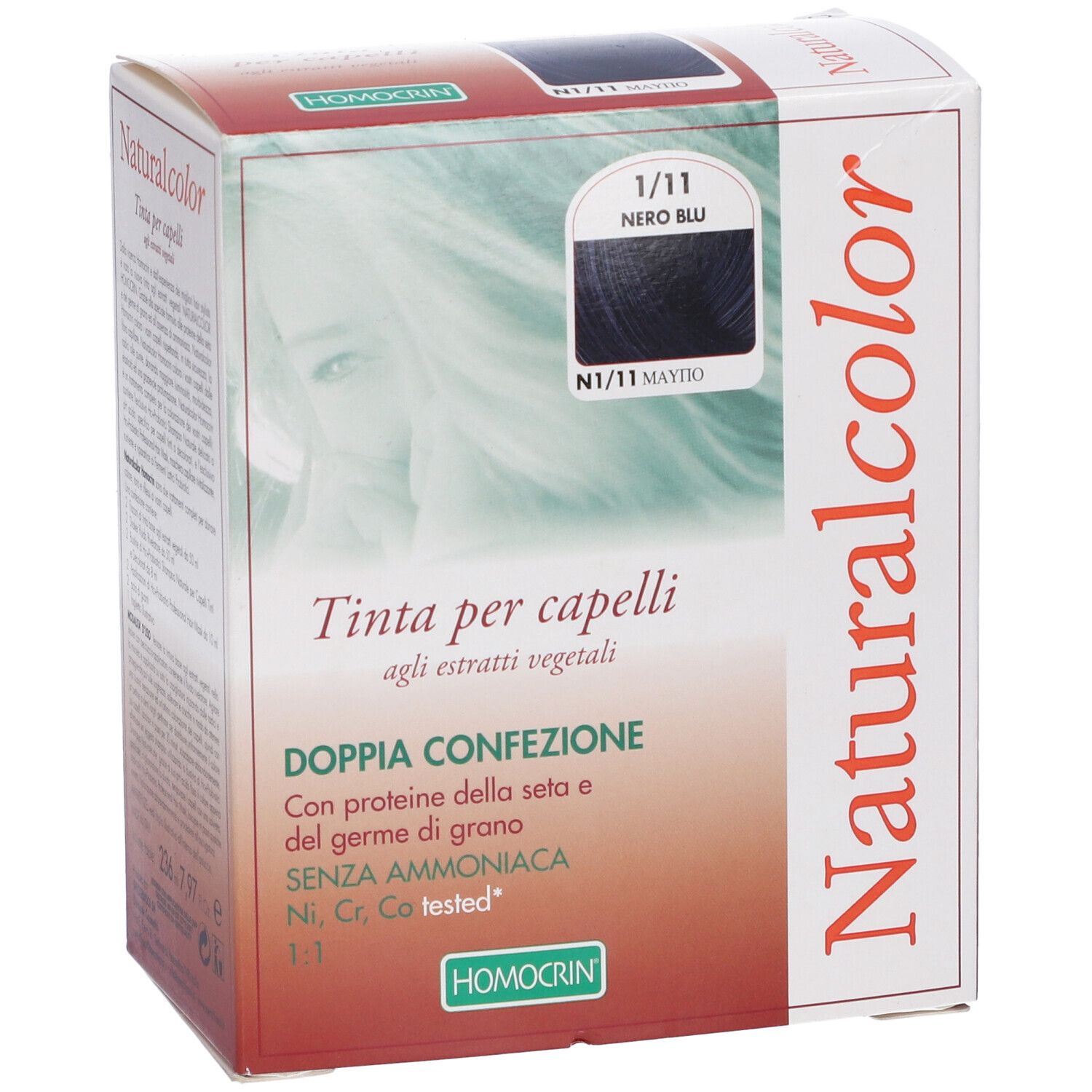 Scatola di tinta per capelli. Naturalcolor, 1/11 Nero Blu. Testo: Tinta per capelli, Doppia confezione. Marchio: Homocrin.