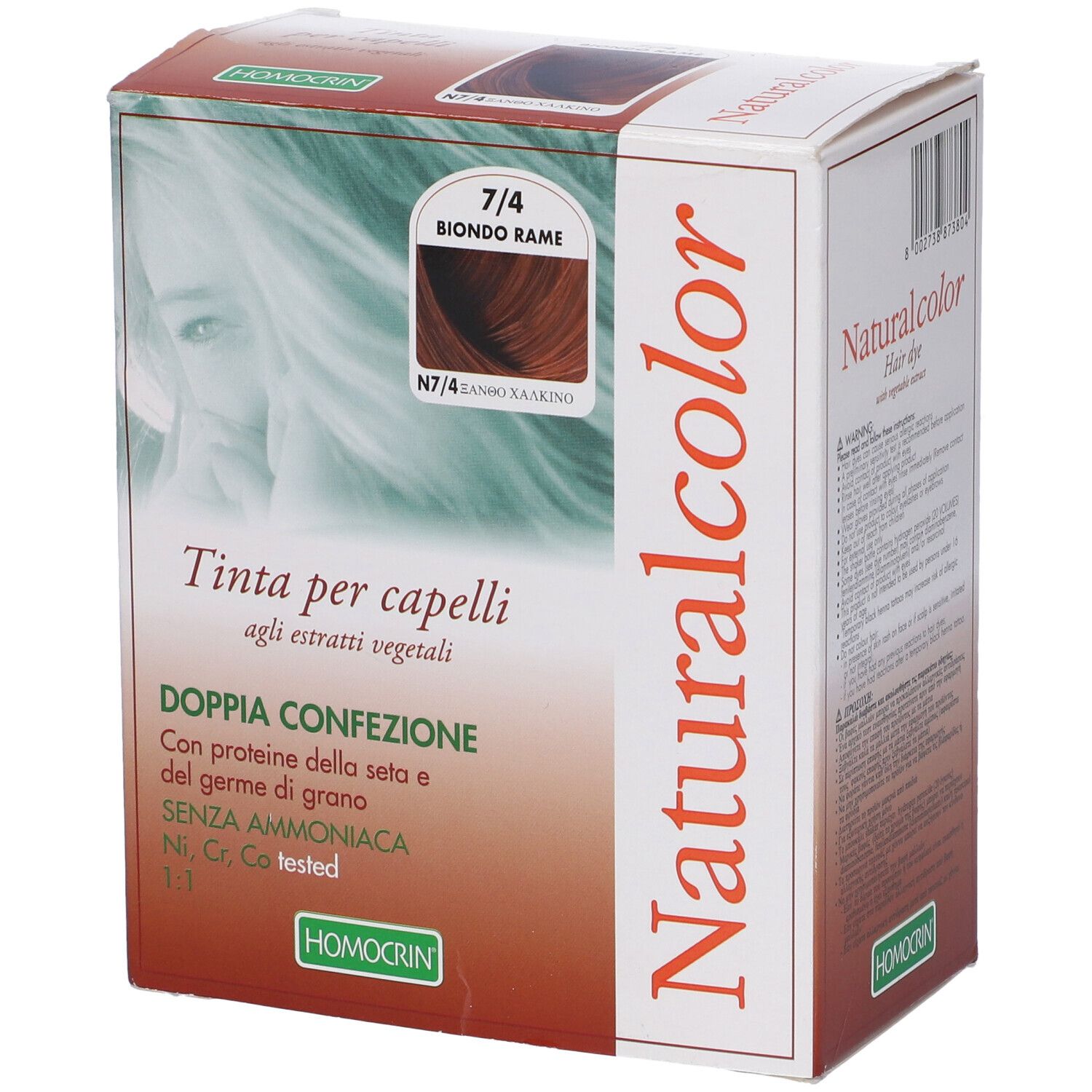 Scatola tinta per capelli Naturalcolor. Tonalità 7/4 Biondo Rame. Testo: Tinta per capelli. Logo Homocrin.