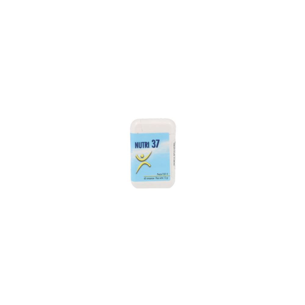 Scatola bianca di compresse con etichetta blu. Scritta: Nutri 37. Logo: figura gialla. Scatola con coperchio.