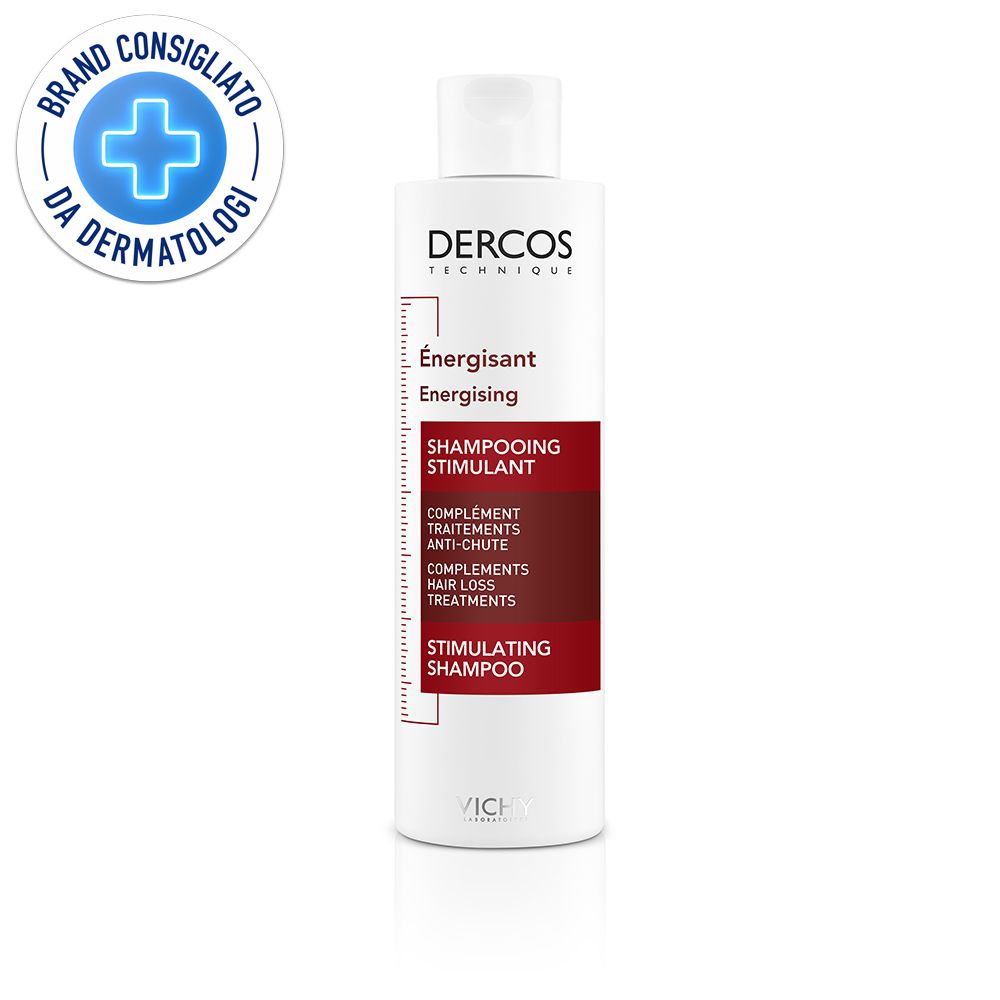 Flacone bianco Vichy Dercos Shampoo. Etichetta rossa con testo: Dercos Technique, Energising, Shampooing Stimulant.