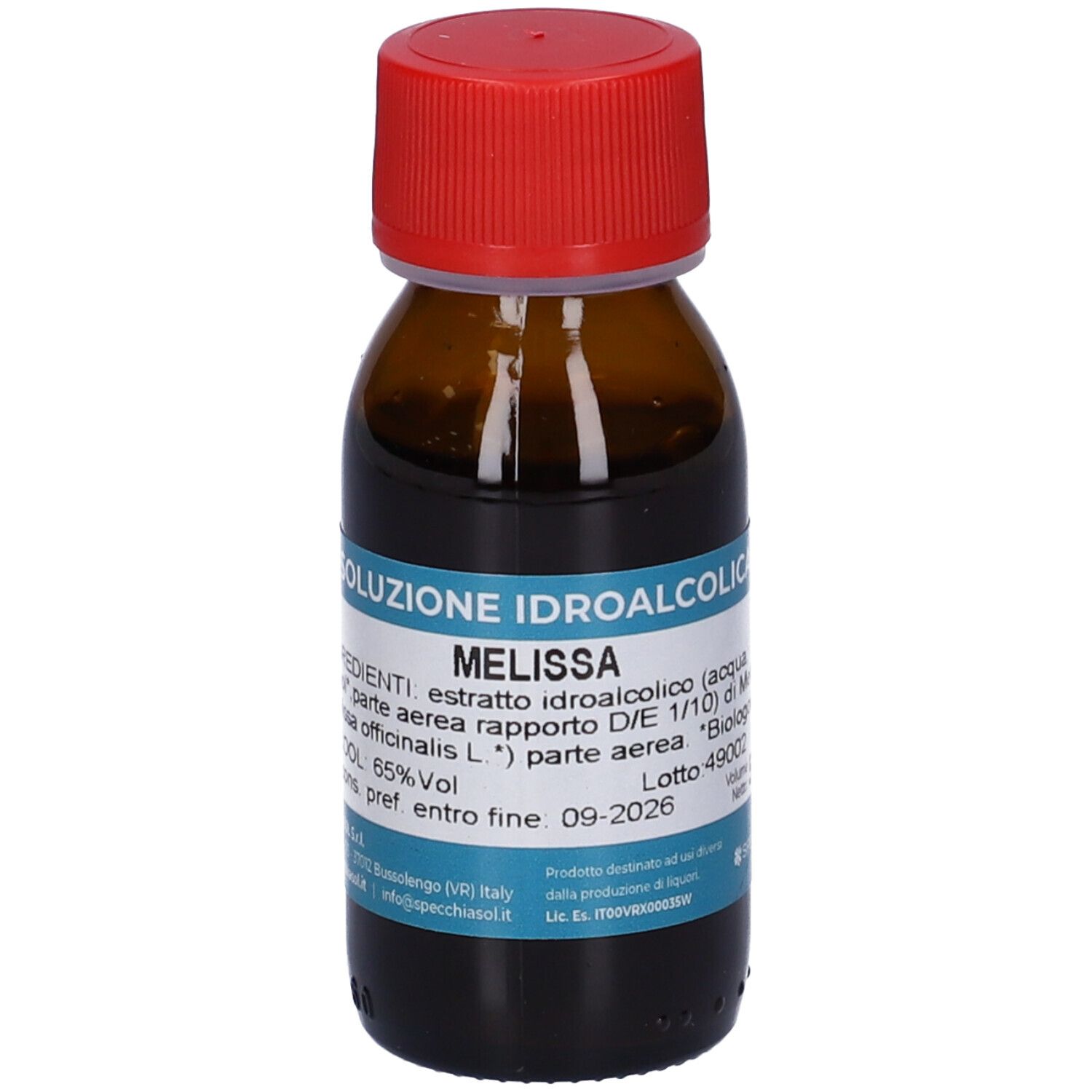 Flacone in vetro marrone con tappo rosso. Scritta: Melissa. Etichetta con ingredienti e gradazione alcolica. 50 ml.