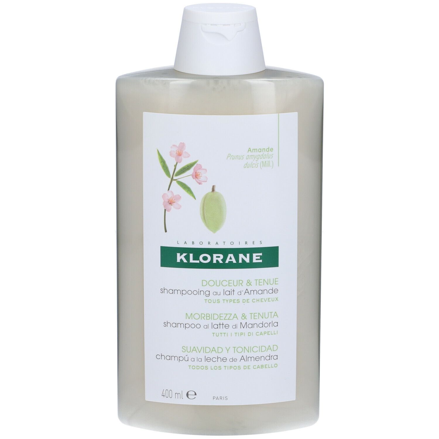 Shampoo-Flasche mit weißem Etikett. Aufschrift: KLORANE, Douceur & Tenue, Shampooing au lait d'Amande, Morbidezza & Tenuta, Suavidad y Tonicidad.