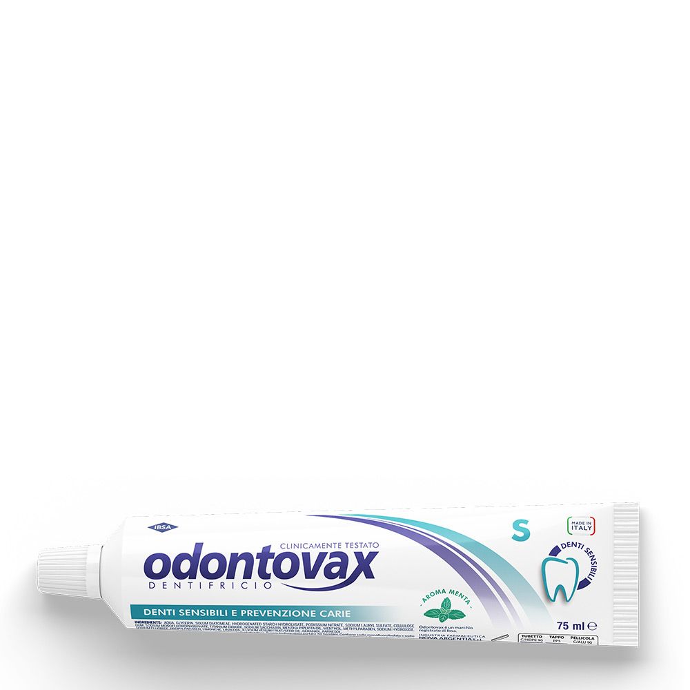 Tubo di dentifricio bianco, blu e verde. Scritta: Odontovax, S, per denti sensibili e prevenzione carie. Gusto menta.