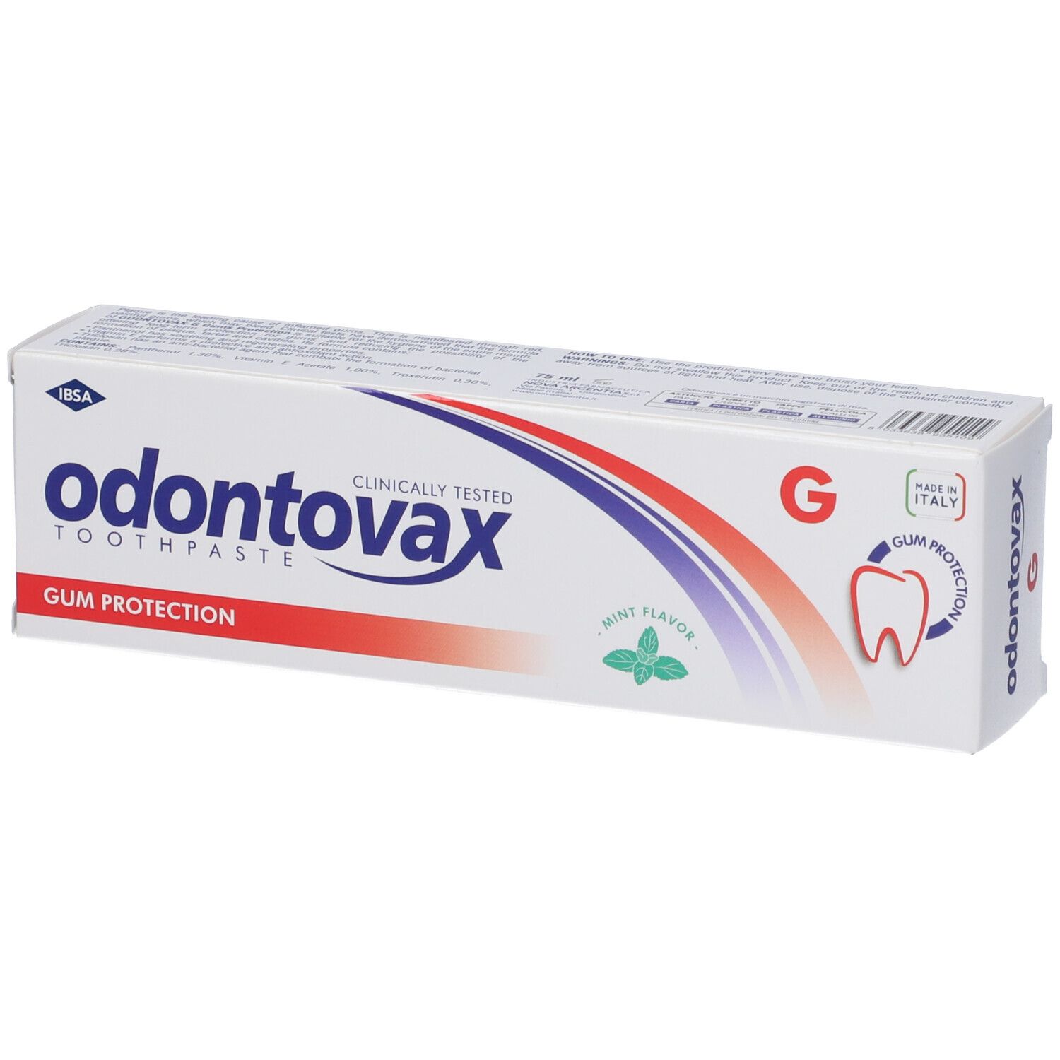 Scatola di dentifricio in diagonale dall'alto. Scritta: Odontovax, clinicamente testato, protezione gengive. Aroma menta. Dettagli sul lato.