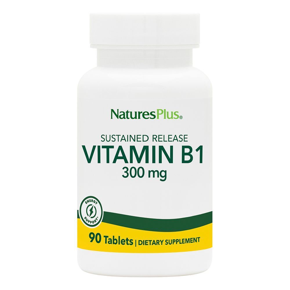 Flacone bianco di vitamina B1. Scritta: NaturesPlus, Vitamina B1 300 mg, 90 compresse.