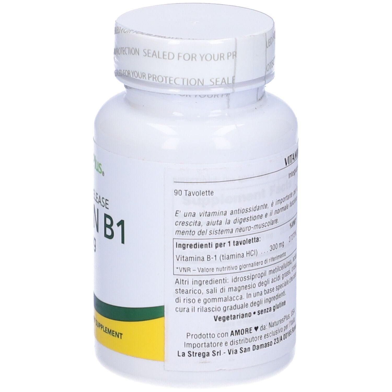 Retro del flacone bianco di vitamina B1. Testo in italiano.
