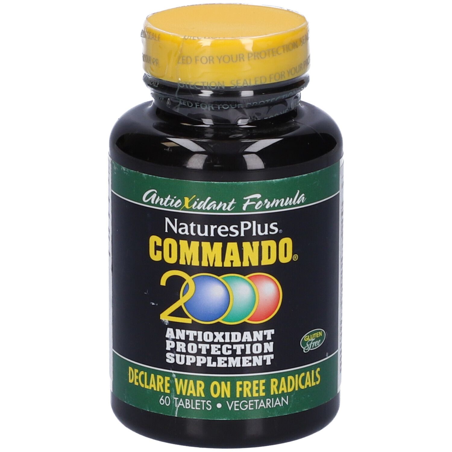 Flacone nero con tappo giallo. Scritta: Commando 2000, integratore di protezione antiossidante. 60 compresse. Senza glutine.
