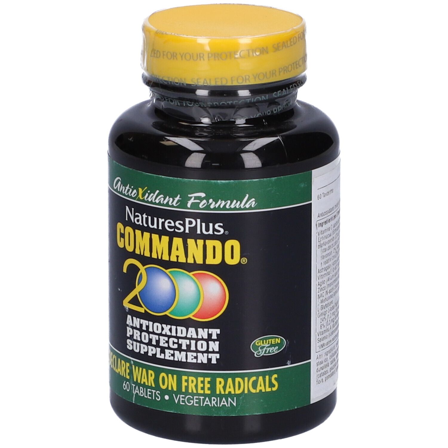 Flacone nero con tappo giallo. Scritta: Commando 2000, integratore di protezione antiossidante. 60 compresse. Senza glutine.