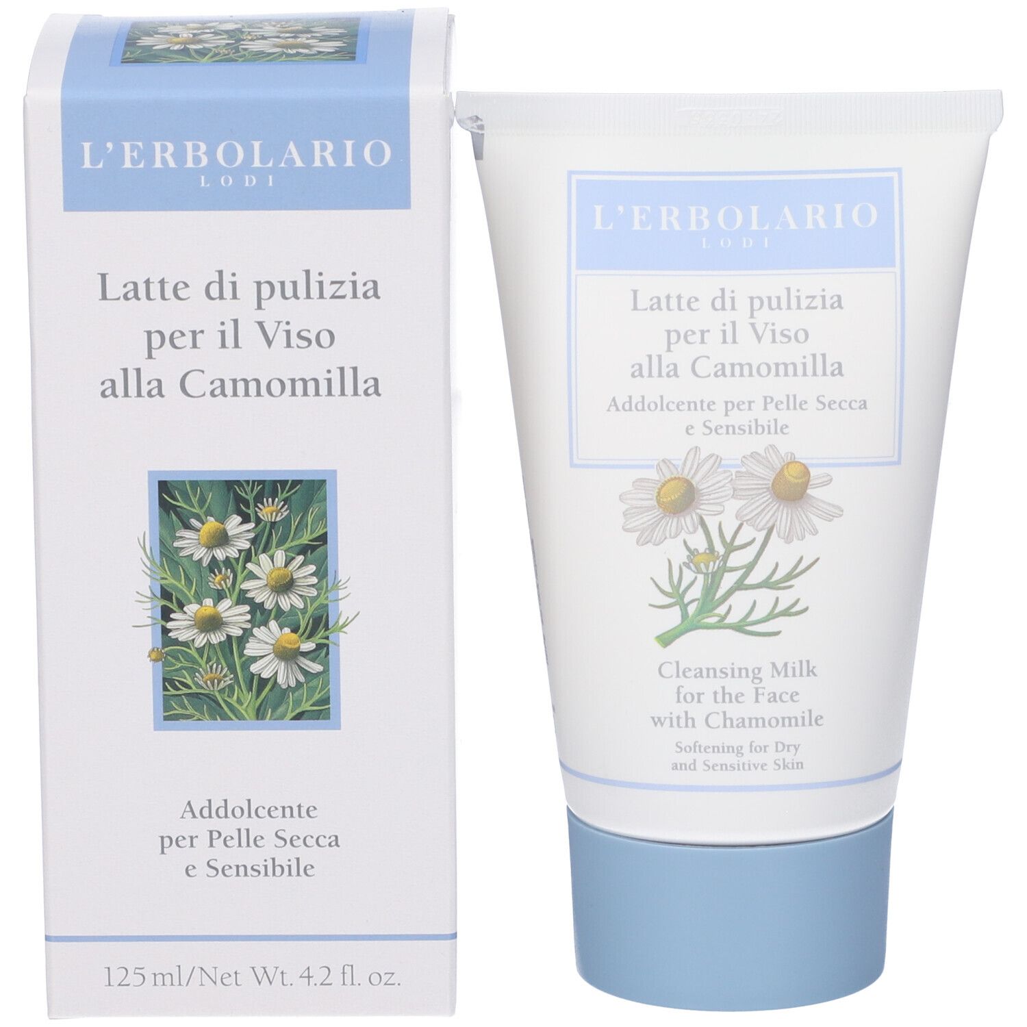 Tubo e confezione di latte detergente. Scritta: L'Erbolario, Latte di pulizia per il Viso alla Camomilla. Illustrazione di fiori di camomilla.