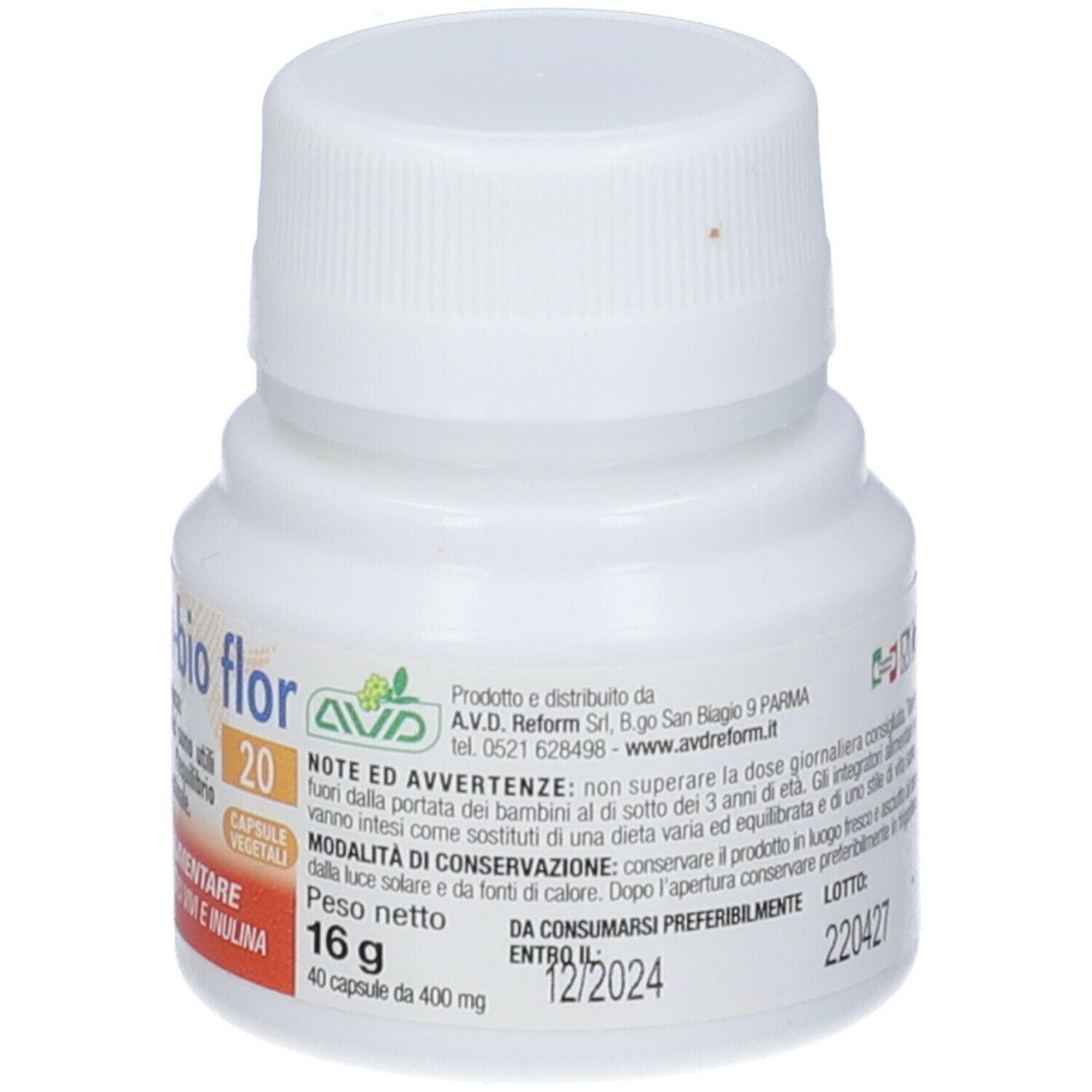 Flacone bianco con tappo a vite. Contiene capsule AVD Maximum-bio flor 20. Etichetta con informazioni e data di scadenza.