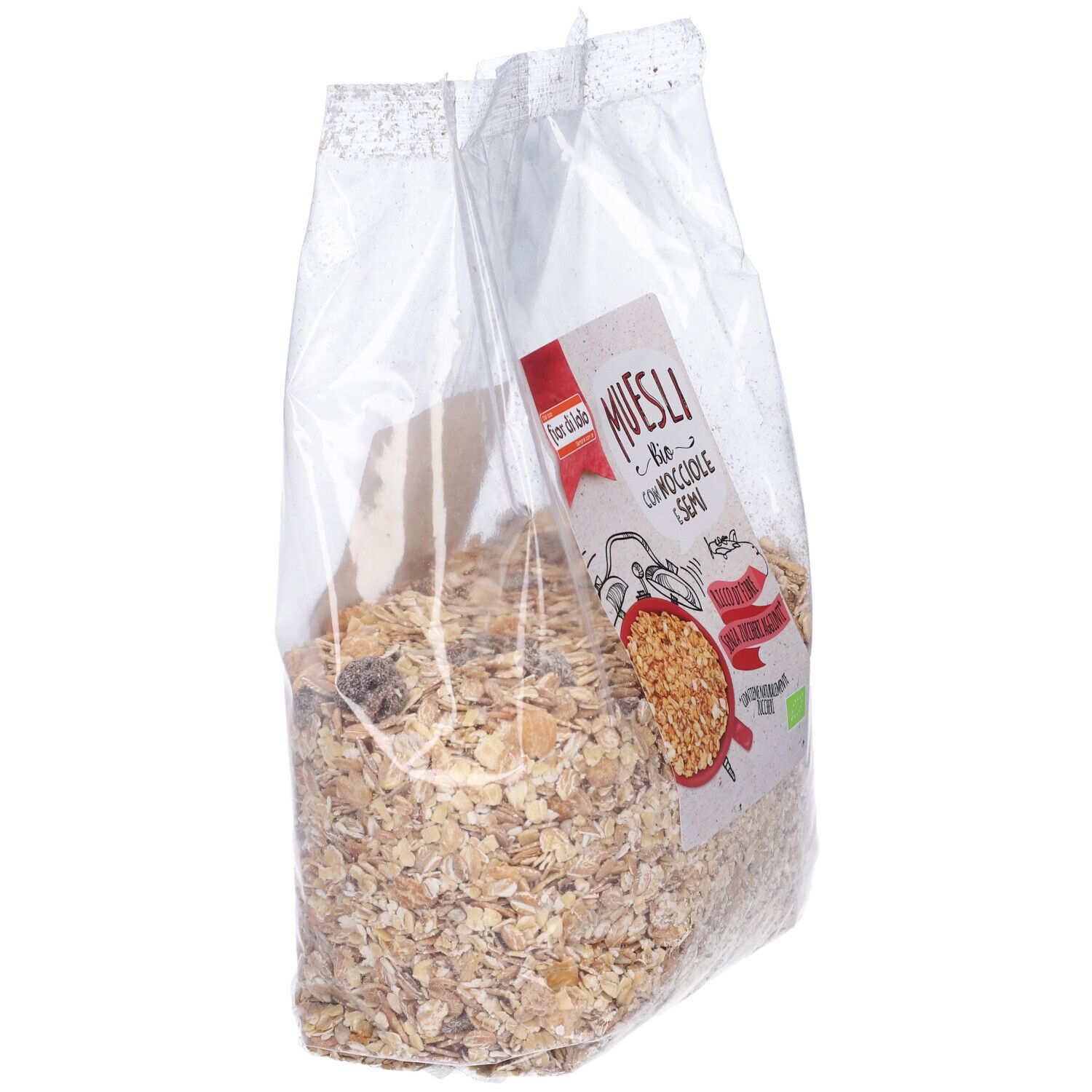 Sacchetto trasparente di muesli. Etichetta 'Muesli Bio con Nocciole e Semi'. Contiene nocciole e semi.
