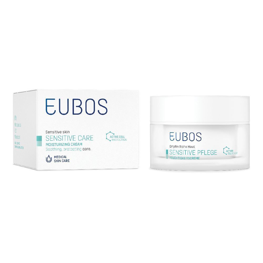 Confezione e vasetto di crema Eubos. Scritta: Sensitive Care, idratante. Design bianco con logo blu.