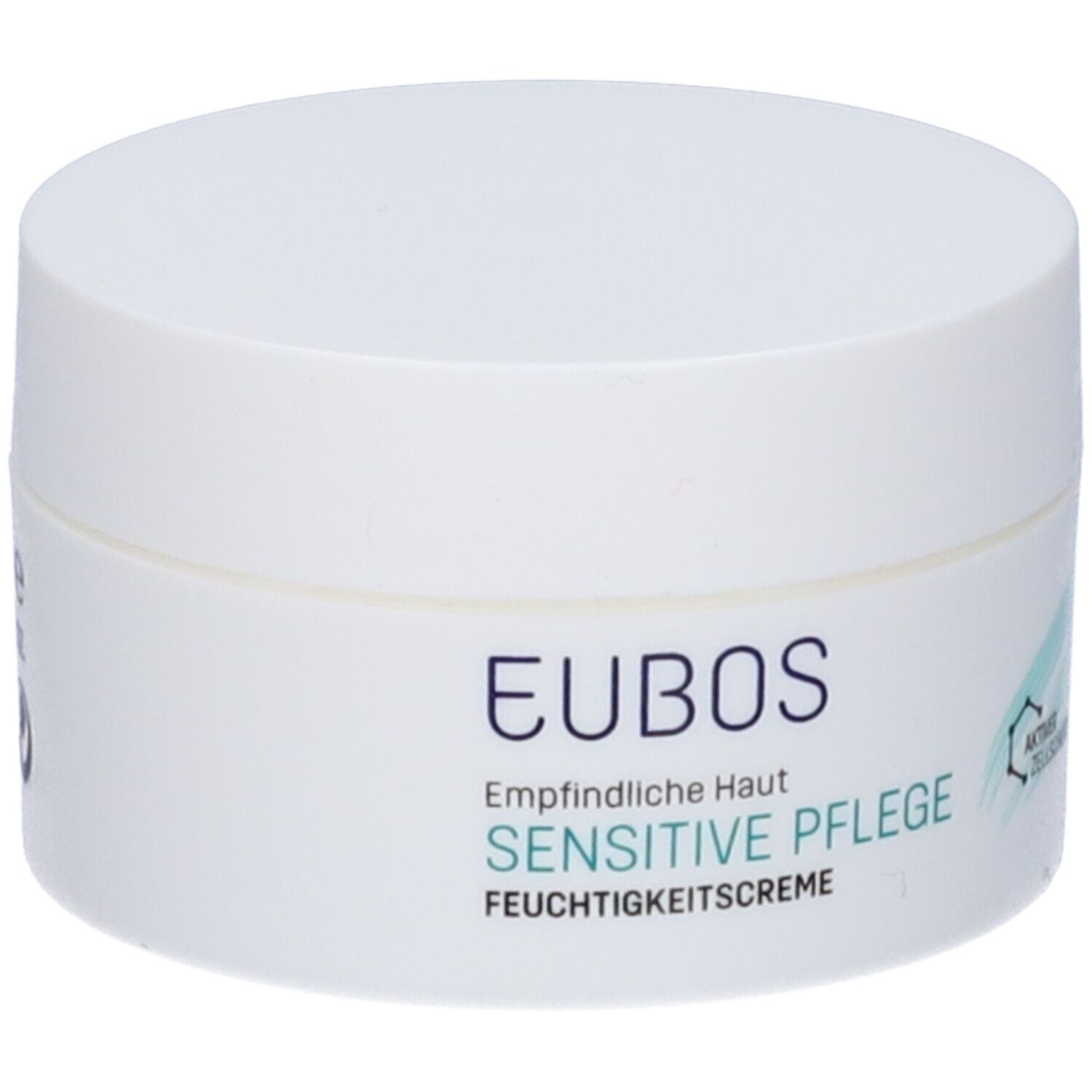 Vasetto di crema Eubos bianco. Scritta: Pelle sensibile, cura sensibile, crema idratante. Accento verde.