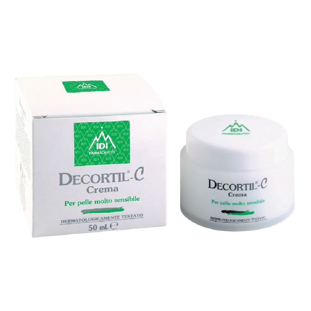 Crema e confezione. Vasetto bianco con coperchio verde. Scritta: Decortil-C Crema. Confezione con logo e testo.