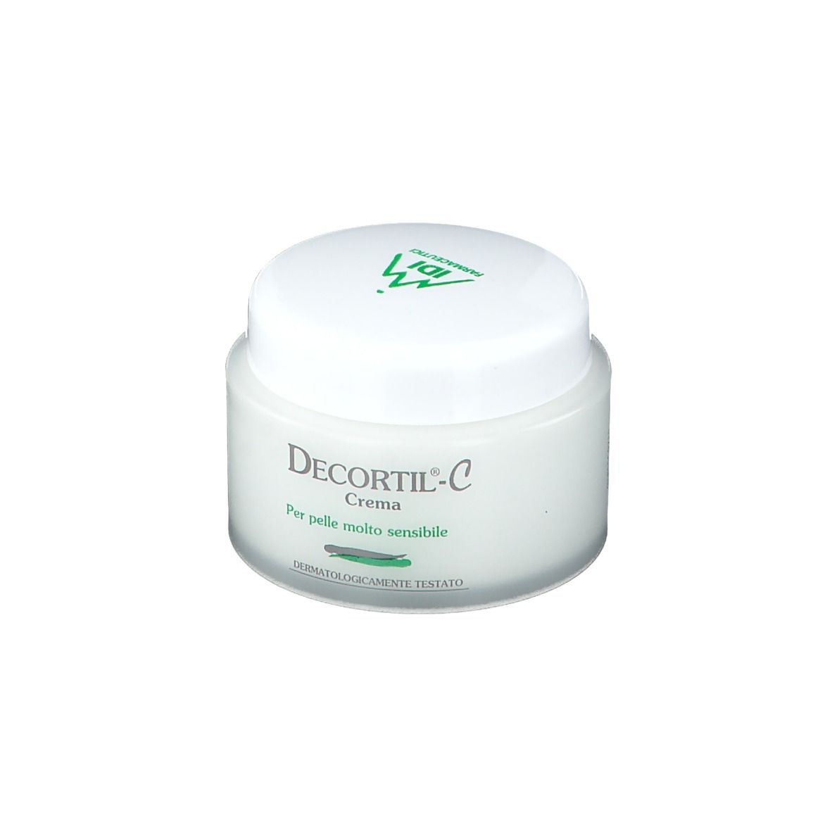 Vasetto di crema bianco con coperchio verde. Scritta: Decortil-C Crema. Per pelli molto sensibili. Dermatologicamente testato.