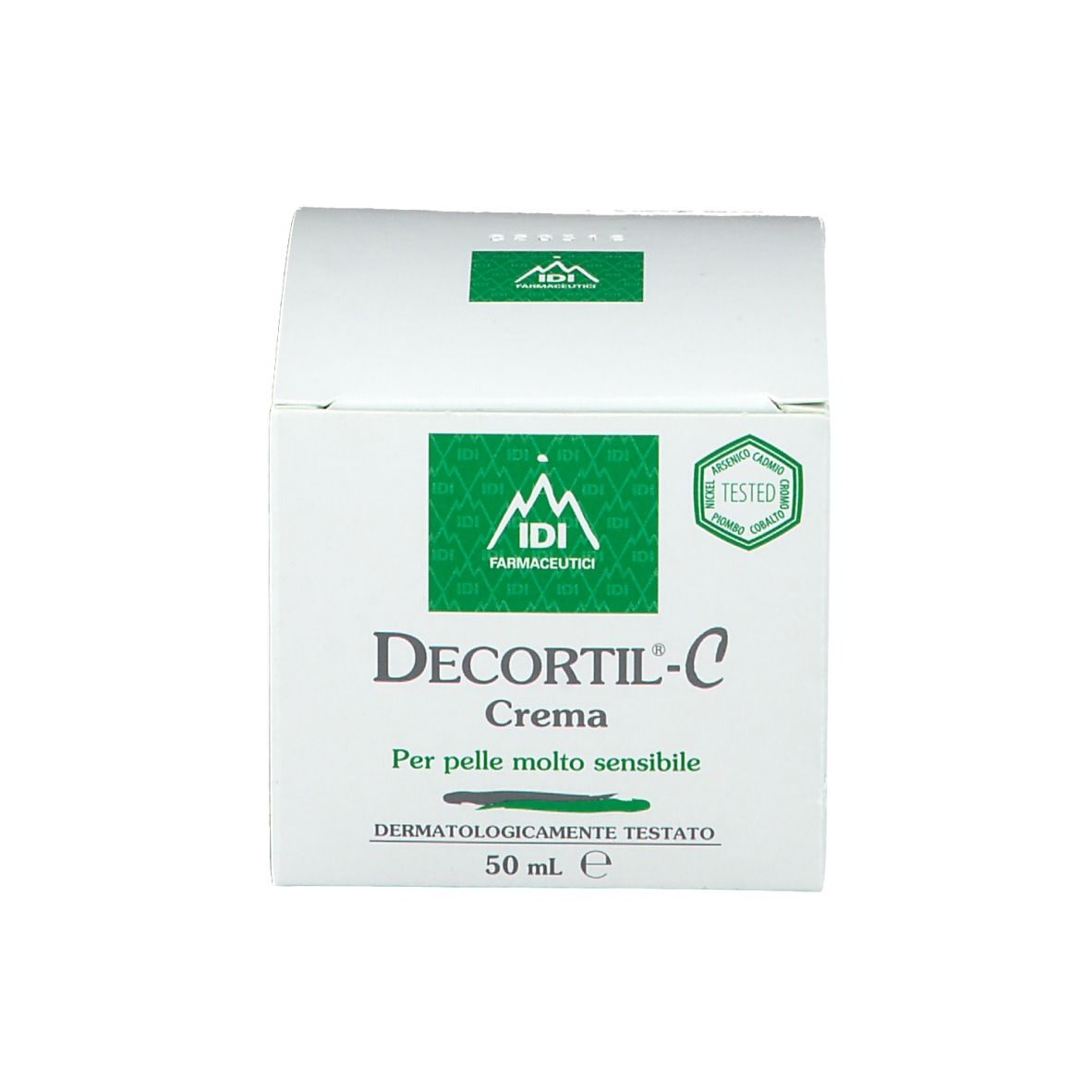 Confezione. Scatola bianca con logo e testo verdi. Scritta: Decortil-C Crema. Per pelli molto sensibili.