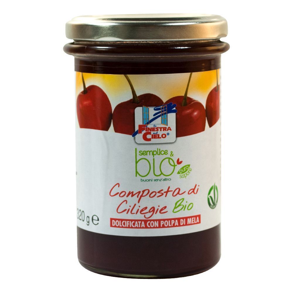 Vasetto di composta di ciliegie. Etichetta con ciliegie, testo: Composta di Ciliegie Bio, marchio bio.