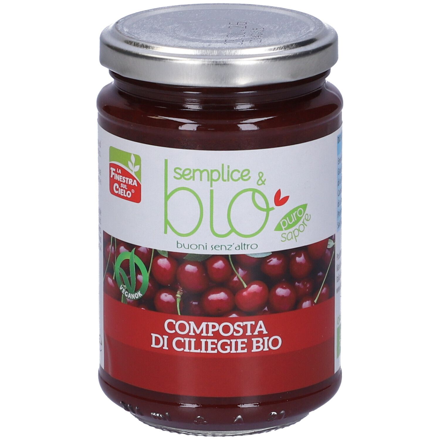 Vasetto di composta di ciliegie. Etichetta con ciliegie, testo: Composta di Ciliegie Bio, marchio bio, vegano.