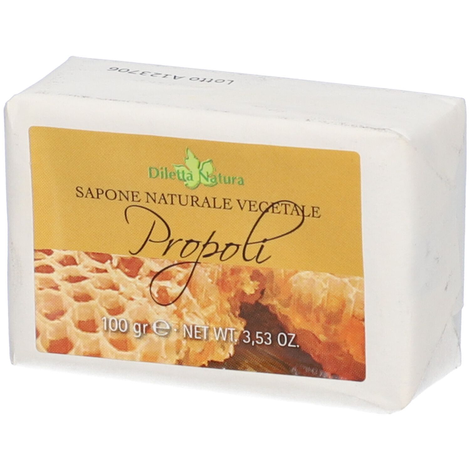 Sapone confezionato in carta. Etichetta con nome prodotto e illustrazione a nido d'ape. Peso: 100 g.