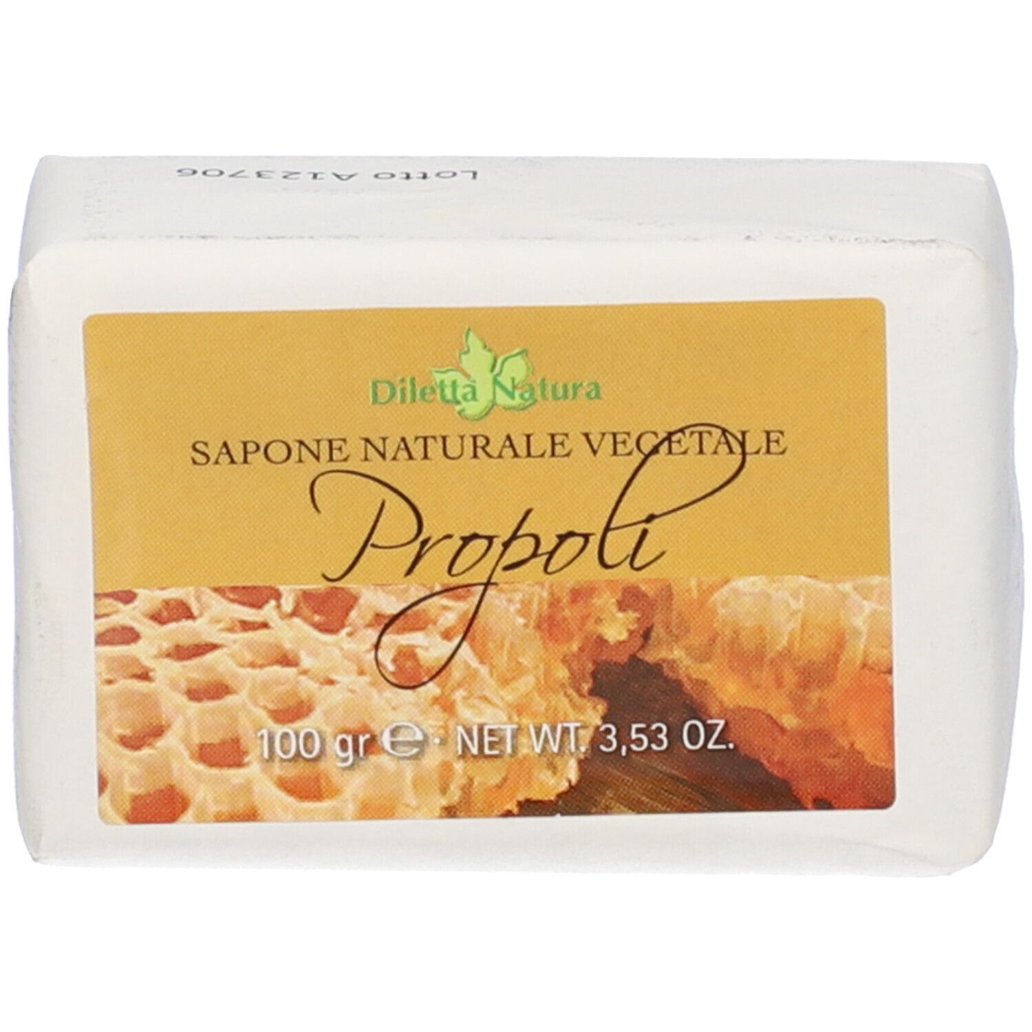 Sapone confezionato in carta. Etichetta con nome prodotto e illustrazione a nido d'ape. Peso: 100 g.