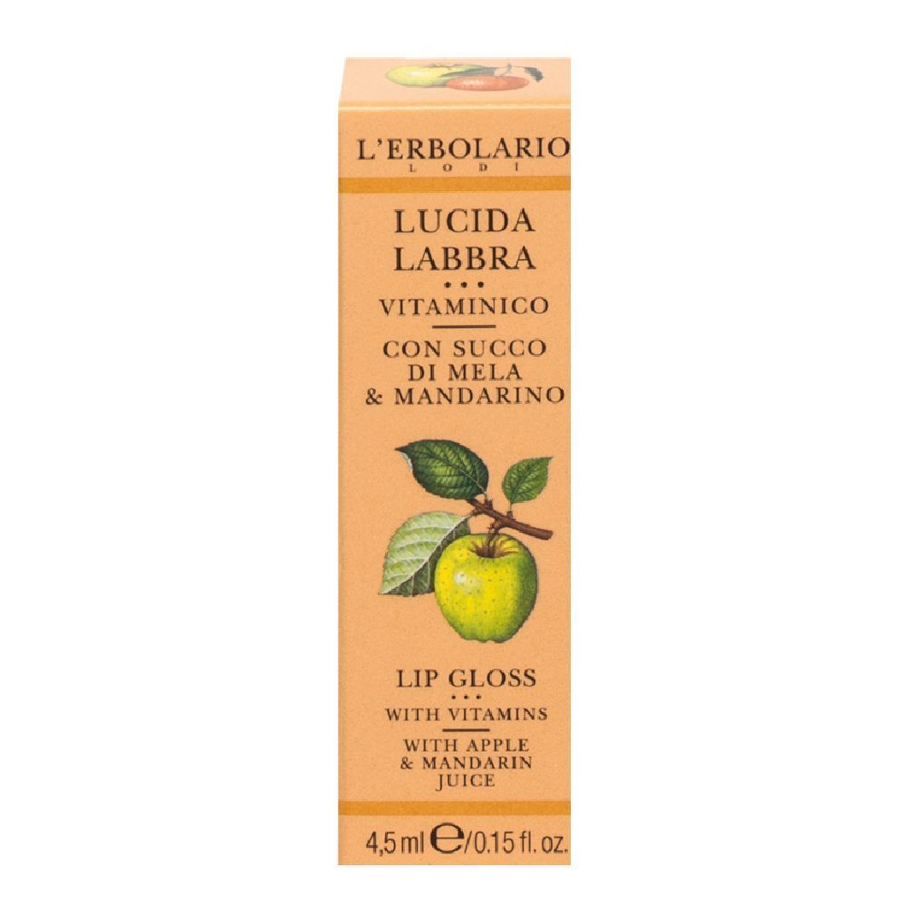 Confezione in cartone con stampa del prodotto. Testo: Lucida Labbra Vitaminico, con succo di mela e mandarino. Illustrazione: mela.
