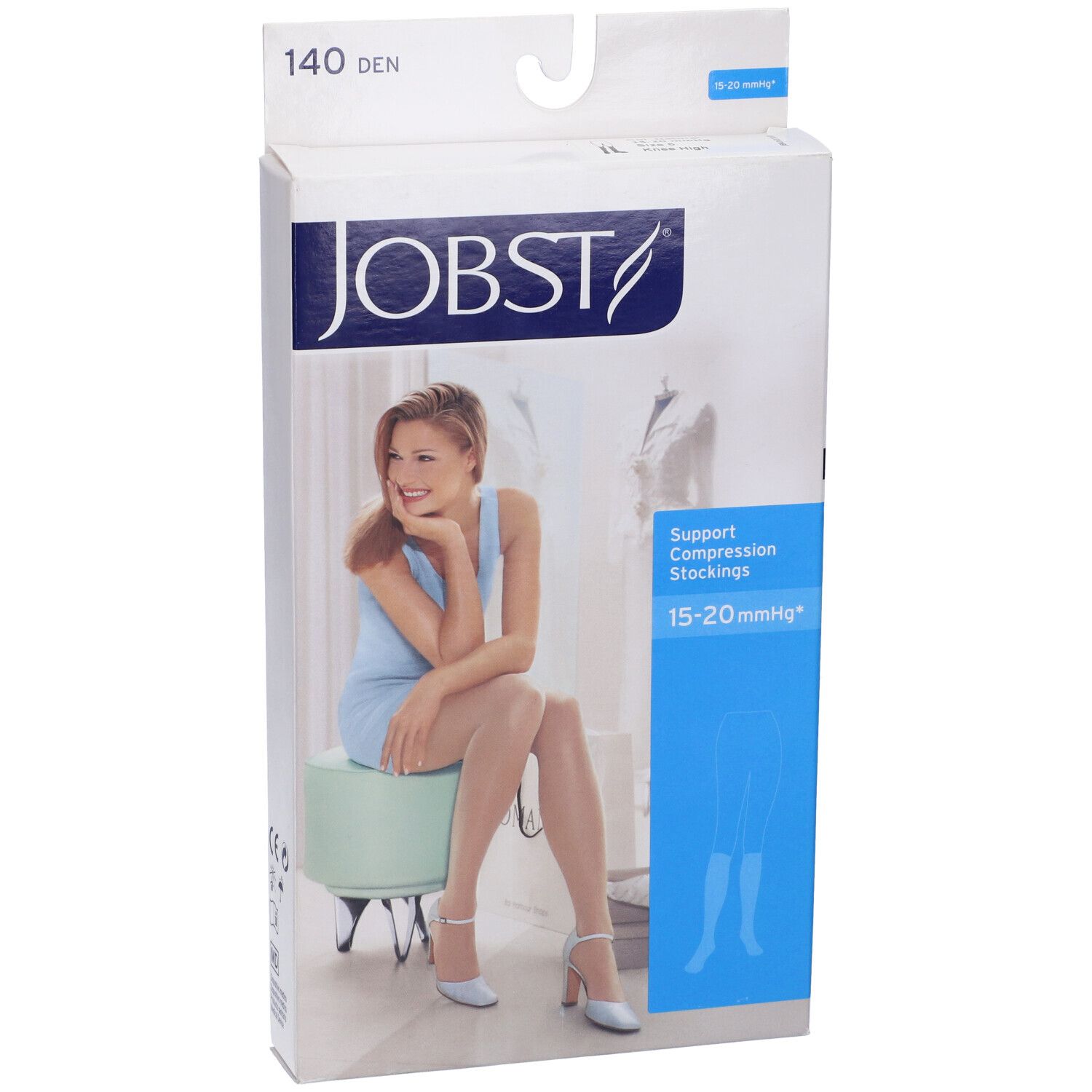 Confezione JOBST. Scritta: 140 DEN, 15-20 mmHg. Donna indossa calze. Illustrazione del prodotto.