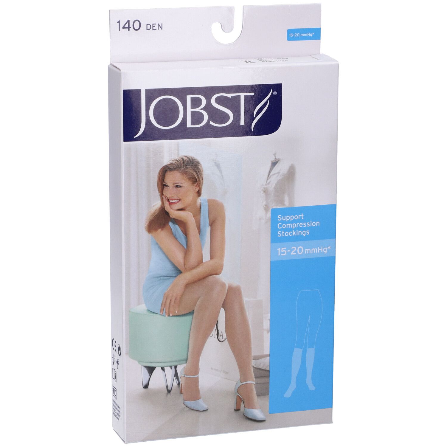 Confezione JOBST. Stampa: 140 DEN, calze a compressione, 15-20 mmHg. Donna seduta su sgabello, indossa calze.
