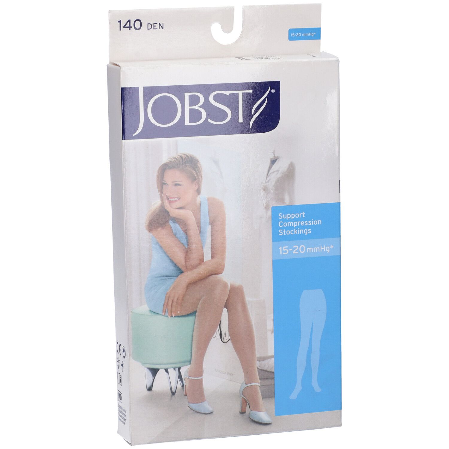 Confezione JOBST. Donna seduta su sgabello. Scritto: calze a compressione 15-20 mmHg. 140 DEN.