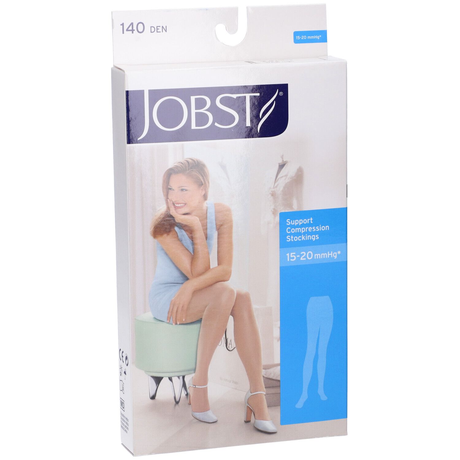 Confezione JOBST. Donna seduta su sgabello. Testo: 140 DEN, 15-20 mmHg, Support Compression Stockings.