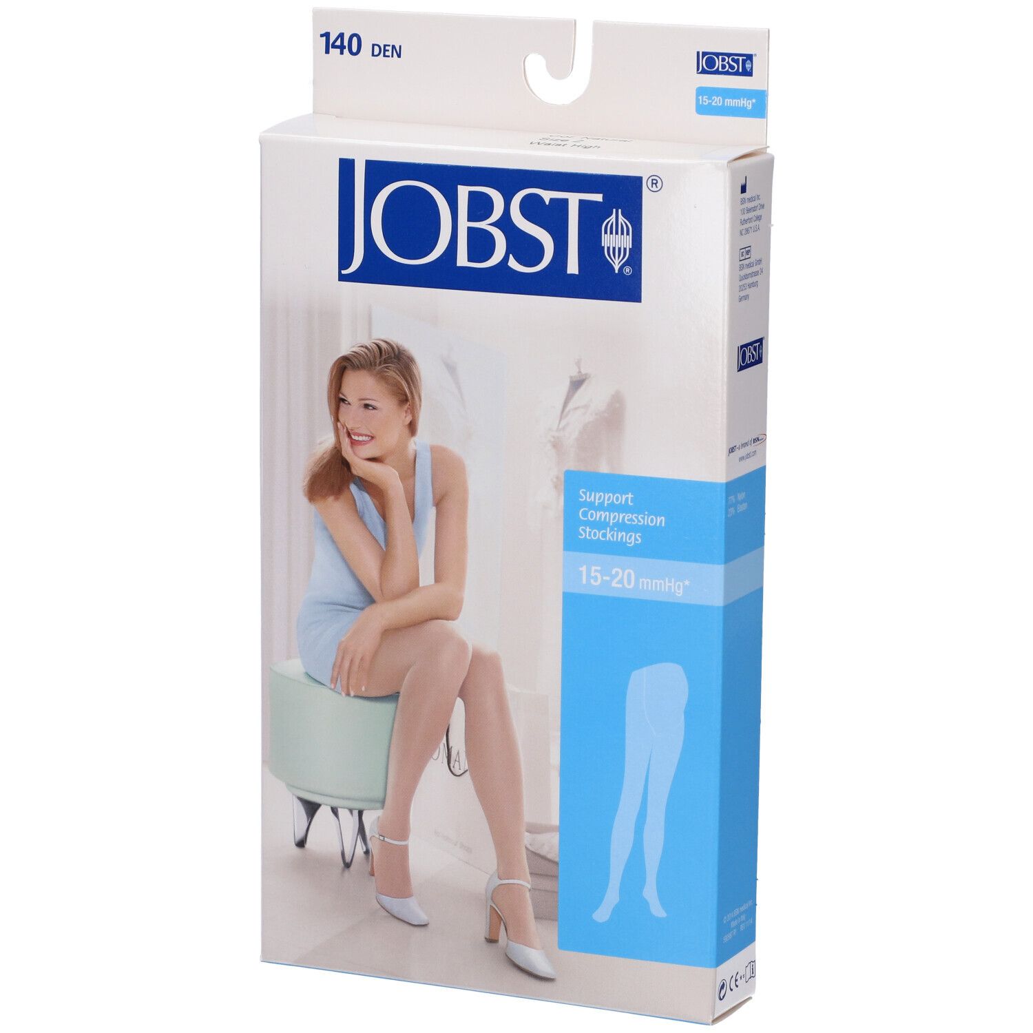 Confezione JOBST con calze a compressione. Scritto: 15-20 mmHg, beige. Donna seduta su uno sgabello.